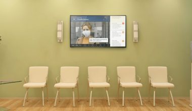 medical clinic waiting room with digital display